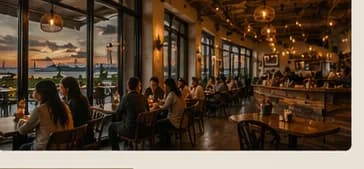 community gathered inside a warmly lit cafe at sunset
